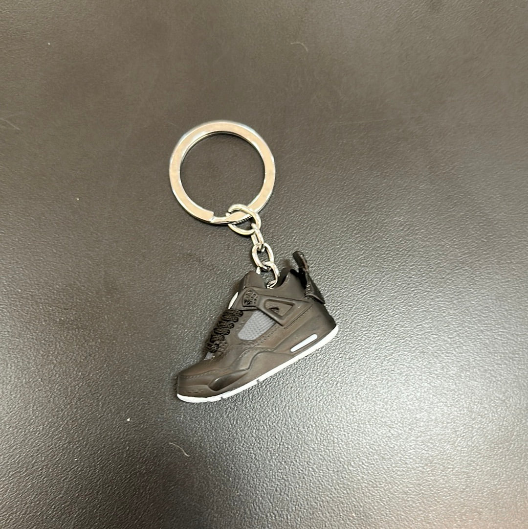 Jordan 4 Black Kaws Keychain